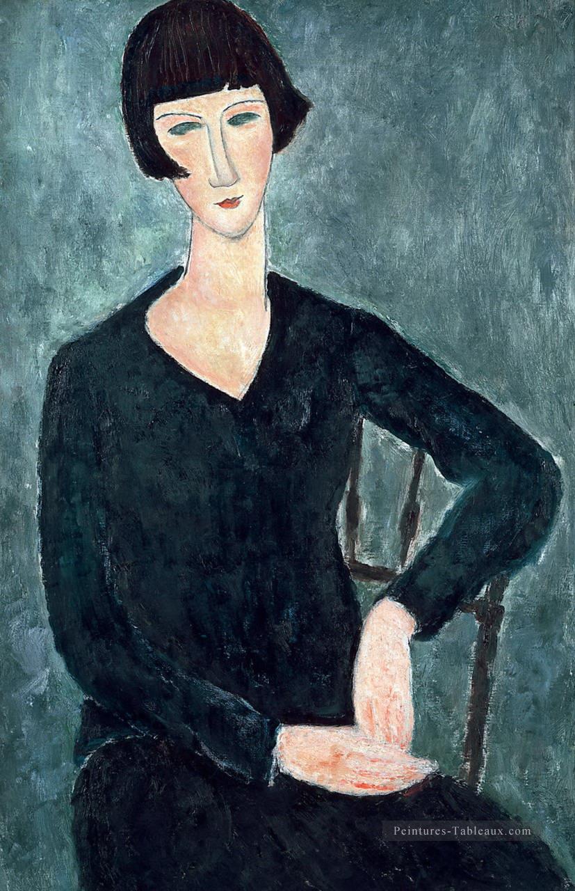 femme assise en robe bleue Amedeo Modigliani Peintures à l'huile